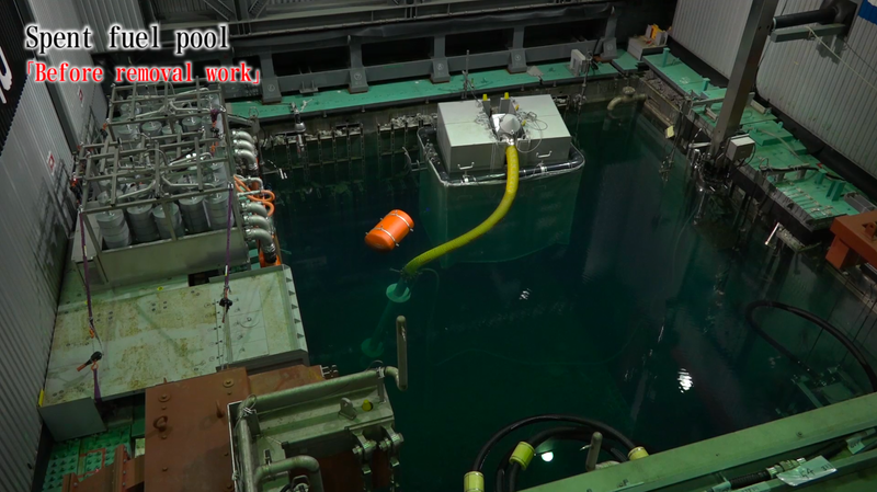 In this image taken before the disaster, the spent fuel pool and the fuel rods can be seen in pristine condition.